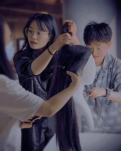 Traditional hairstyle research through physical wig construction and weaving.